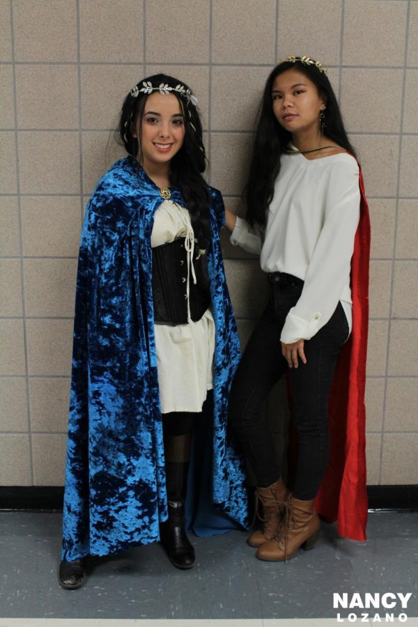  Sporting their royal garb, seniors Anais Anderson and Camille Uy got with the spirit of the homecoming dress up days.