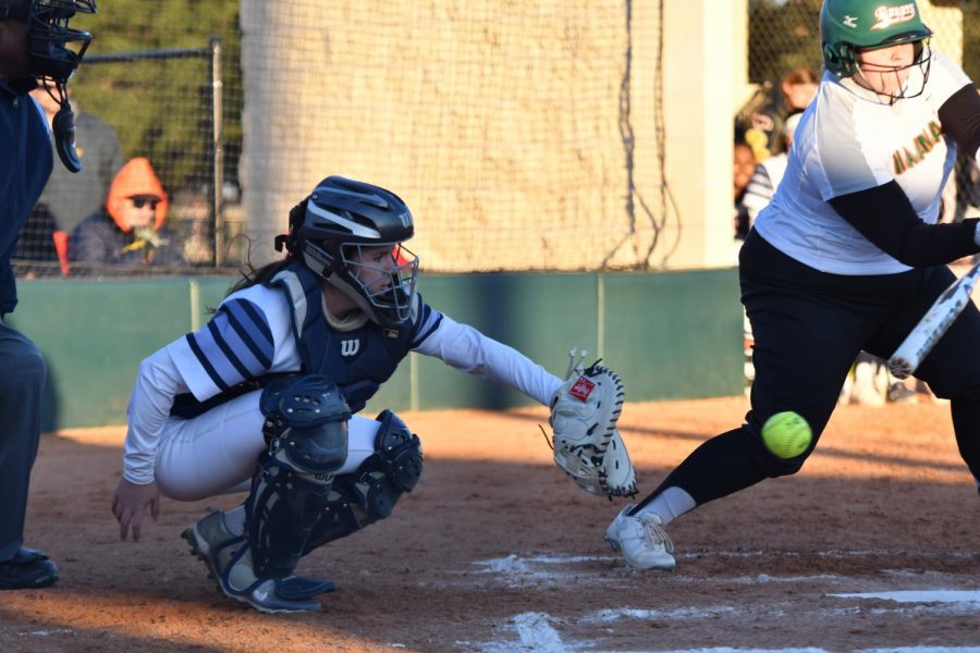 Catcher Skyler Rheaume does her job against Naaman Forest on March 5.  The Mustangs defeated Naaman Forest 22-0 in three innings.