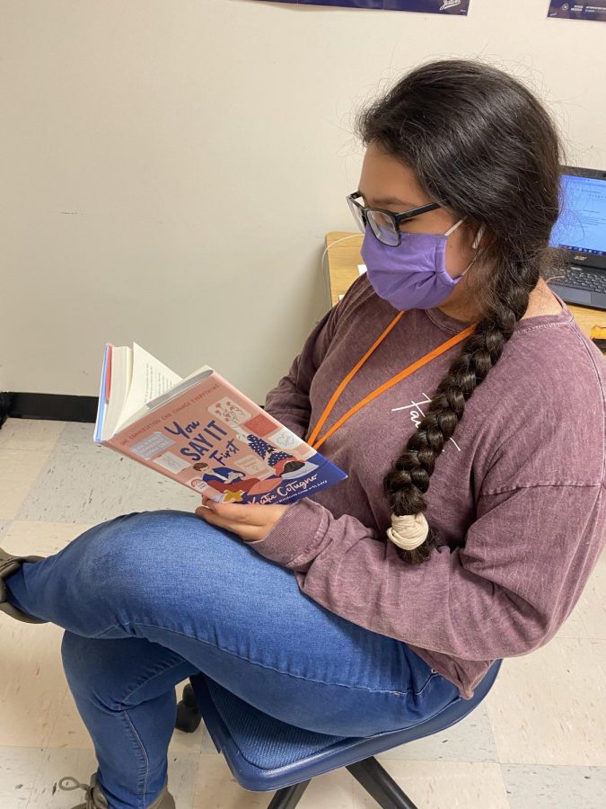 Senior+Stephanie+Gonzalez+enjoys+a+book+during+Mustangs+Read.