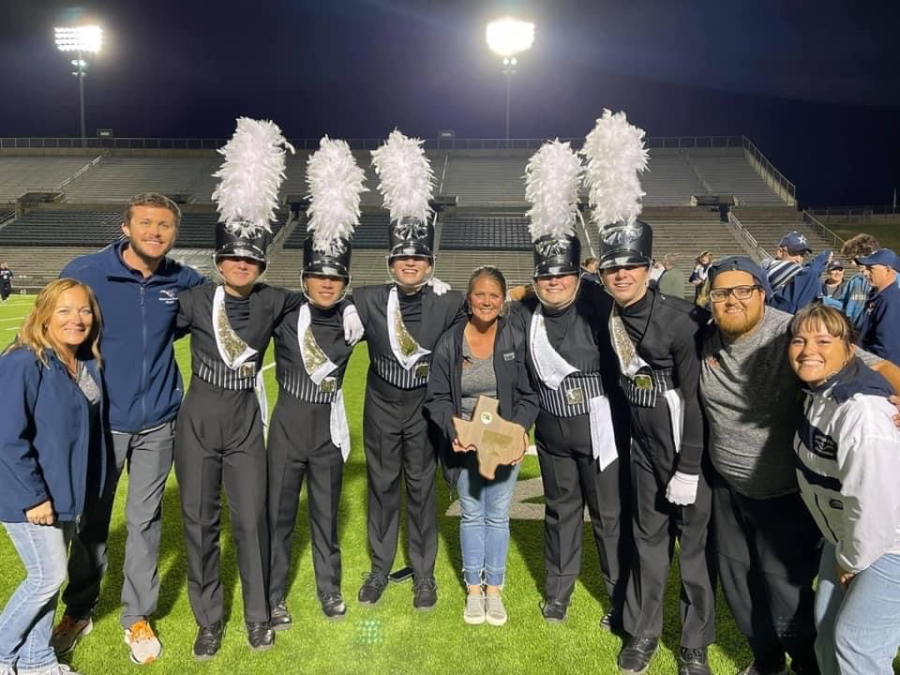 percussion tech Sue Manaois, band director Kevin MacDonald, drum majors Zoey Mosley, Collin Jarvis, Harrison Burnside, band director Holly Taylor, drum majors Lauren Fitzgerald, Landon Foy, band director Garrett Tucker and colorguard director Maegan Benavidez