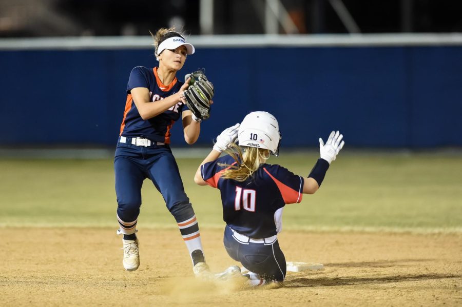 Junior Kelsea Flores gets the out at 2nd base for the Lady Mustangs.