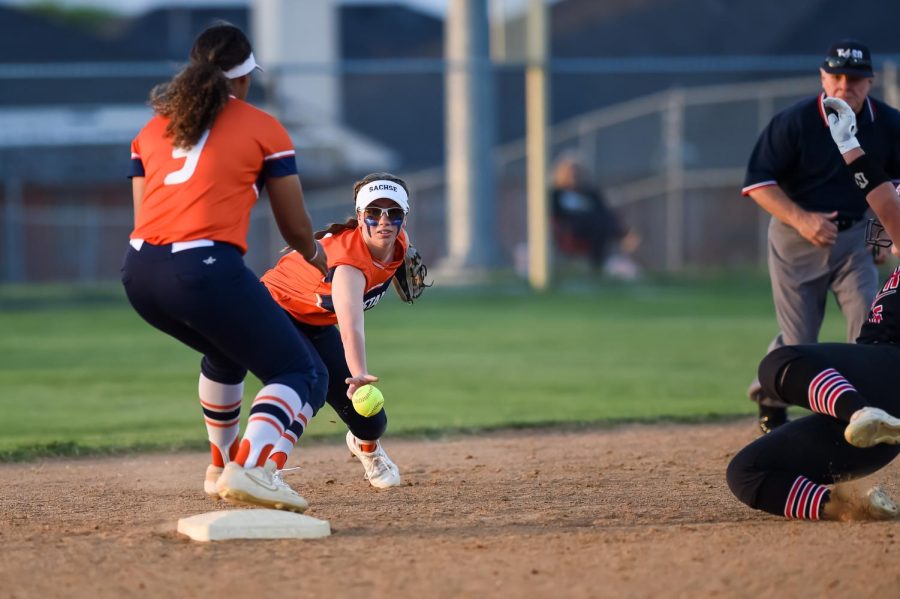 Sophomore Rylie Clem makes the play to senior Madison McClarity for the out at second base.