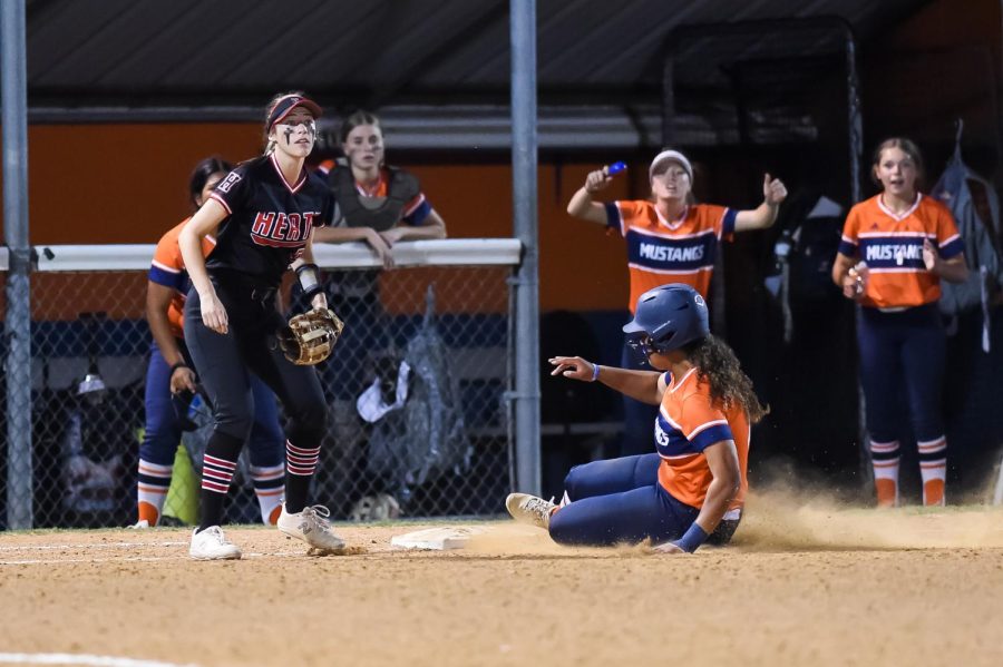 Senior Madison McClarity slides into second base. McClarity was the only Lady Mustang in the first game of the playoffs to hit a triple.