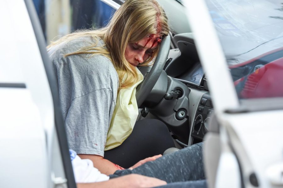 As the driver of the other car, senior Emma Patton played the part of an unconscious victim.