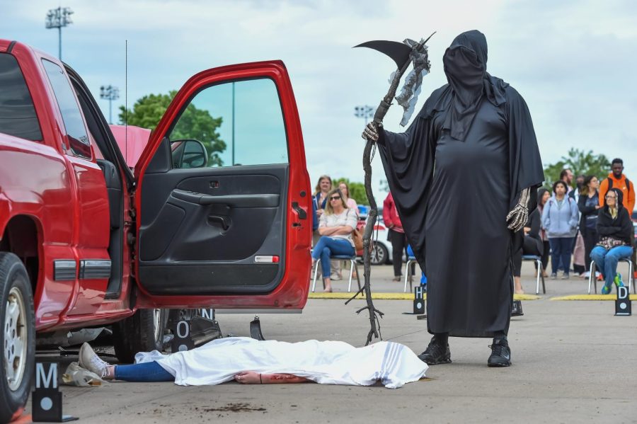 The grim reaper stood over the body of senior Hannah Bergstrom during the program.